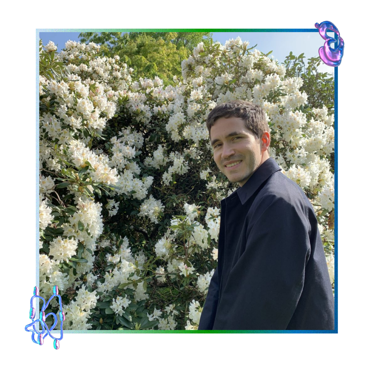 The picture is a portrait of myself made by my partner Ellen Lapper. I'm standing in front of a beautiful blossomed tree and I'm facing the camera.